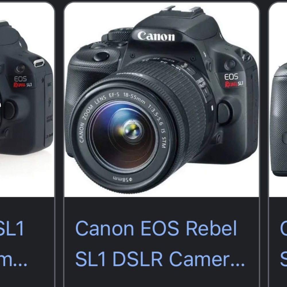 Canon Camera, barley used comes with extra lenses, bag, battery, and charger.
